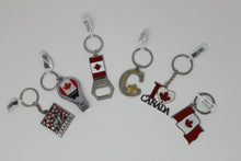 Load image into Gallery viewer, Canada Keychain Souvenir 6 Pack - Bear, Flag, Love Canada, Maple Leaf, Bottle Opener and Nail Clipper all Included.